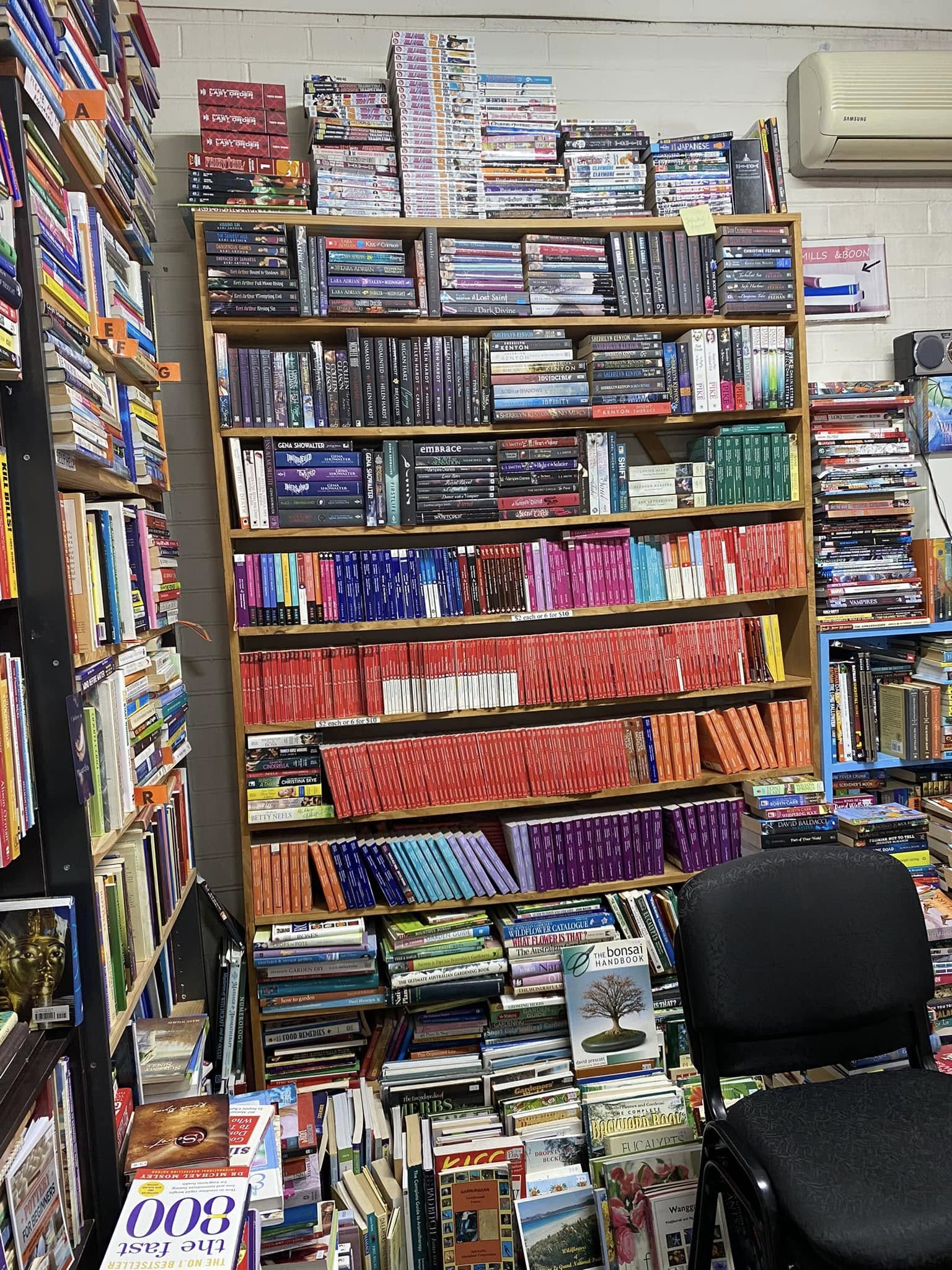 Colourful shelves of second-hand books at Mandurah Central Book Exchange